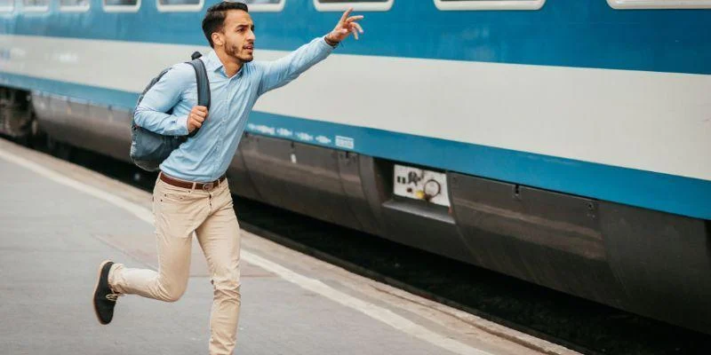 passenger running after a train impacting rail passenger experience at train station